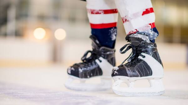 Why do hockey players tape their socks